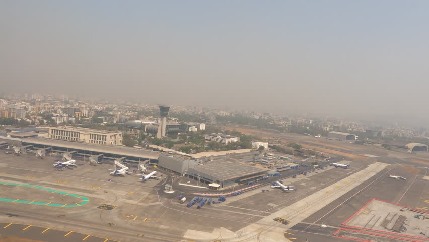 Window view of Juhu Mumbai Indian Landscape smoky skyline 