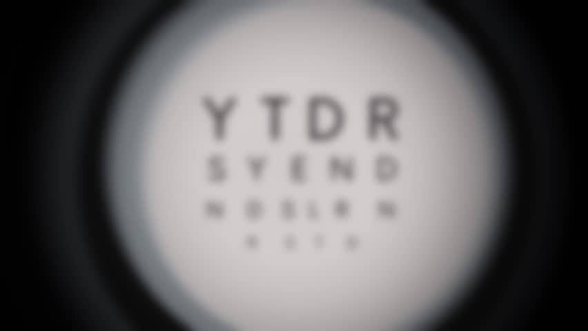 FPV of an eye exam diagnosis at the optometrist while trying to focus the letters, no people | Shutterstock HD Video #1103004589