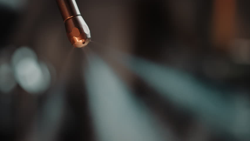 Milk Frother or Milk Steamer in espresso machine releases a hot stream flow from frother wand. Barista making cappuccino and preparing to froth milk. Closeup macro shot with slow motion | Shutterstock HD Video #1103006255