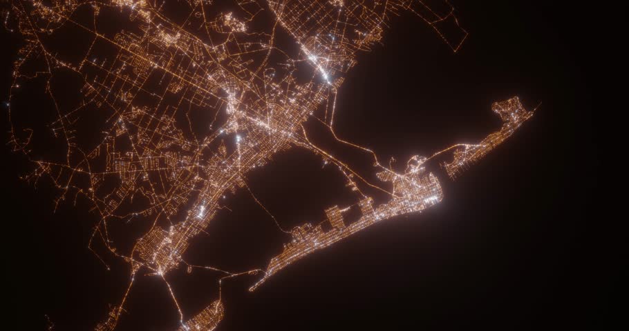 Atlantic City (New Jersey, USA) aerial view at night. Top view on modern city with street lights. Camera is zooming out, rotating clockwise