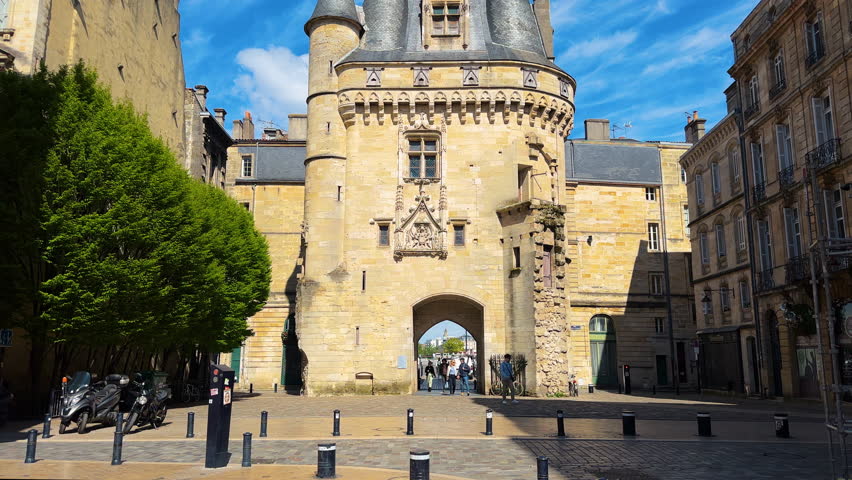The door or gate Porte Cailhau is beautiful gothic architecture from the 15th century. It is both a defensive gate and triumphal arch. Bordeaux, France. High quality 4k footage.