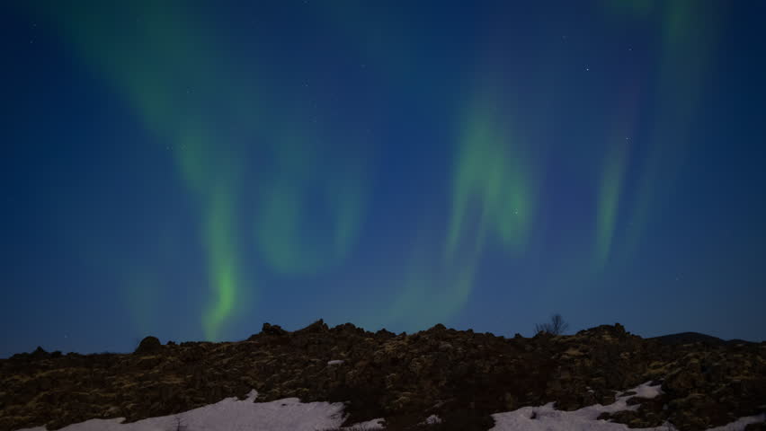 Aurora borealis. Northern lights in Iceland. Real night sky with stars in time lapse.  | Shutterstock HD Video #1103013273