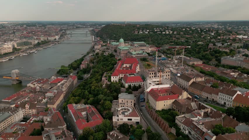 Aerial view of Budapest. Stephens Basilica, River Danube, Budapest Parliament, Castle Hill. Aerial view of Budapest's Castle Hill district. Budapests Buda Castle. Royalty-Free Stock Footage #1103016035