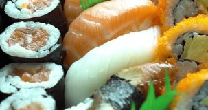 Sushi rolls set with salmon and tuna fish Japanese food traveling culinary concept video ads presentation 4k