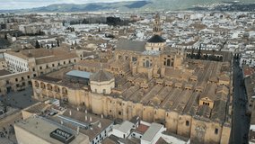 Aerial video of Mezquita, also known as Mosque-Cathedral of Cordoba, a most recognizable landmark of Cordoba, Andalusia, Spain.