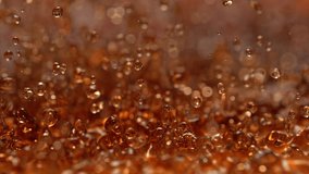 Fizzy Soda Splashing in Slow Motion - Abstract Bouncing Brown Carbonated Liquid Makes Droplets and Splashes - Powered by Shutterstock - Get 15% off with code: PIKWIZARD15