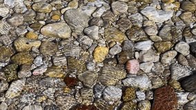Pure Sea Water and Little Stones Pebbles in Underwater Video