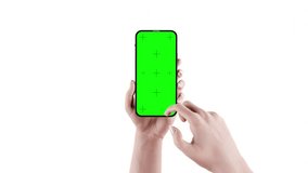 A woman's hand holds a smartphone with an empty screen - animation of scrolling through the content of the application - fast scrolling. The video clip includes screen and background masking, looped