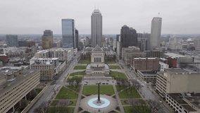 Veterans' Memorial Plaza in downtown Indianapolis with drone video wide shot moving in and tilting down.