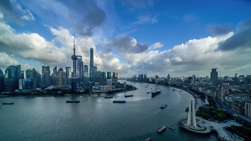 China Shanghai, Panorama of Pudong. Aerial view of Shanghai skyline from skyscraper. Zooming In.