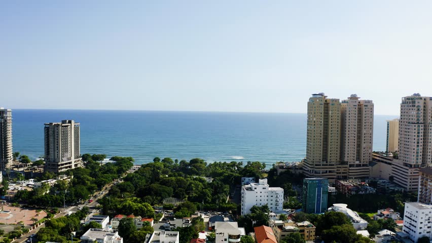 Aerial view of Santo Domingo, Dominican Republic, featuring modern architecture, modern skyline, and bustling streets. Ideal for showcasing the vibrant capital