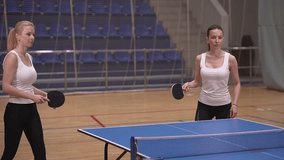 a group of people is playing table tennis. slow-motion video.Full HD high-quality video recording