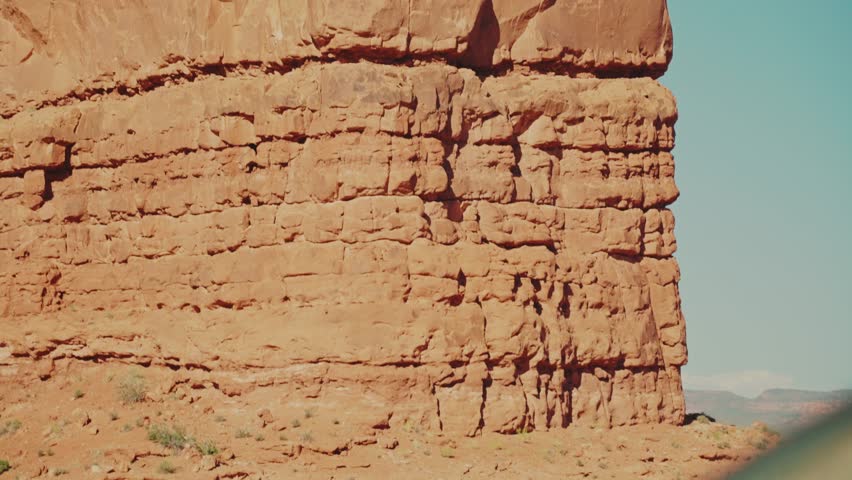 Pan up of rock formation, Arches National Park