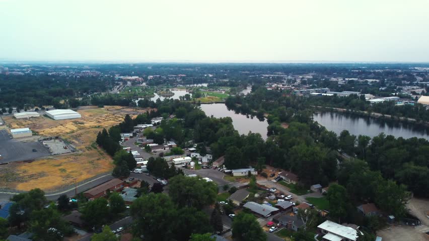 Aerial View Of Creek, Boise Cascade Lake, And Boise River From Veterans Memorial Park In Idaho. 