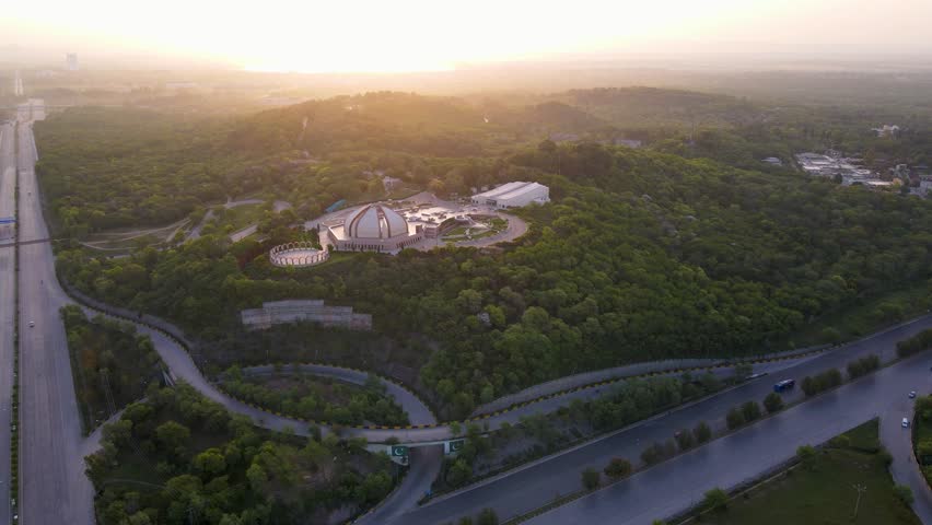 The Beauty of Nature and Architecture: A Drone Flight over Shakarparian in Islamabad Royalty-Free Stock Footage #1103056181