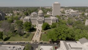 Mississippi State Capitol building in Jackson, Mississippi with drone video wide shot moving in a circle.
