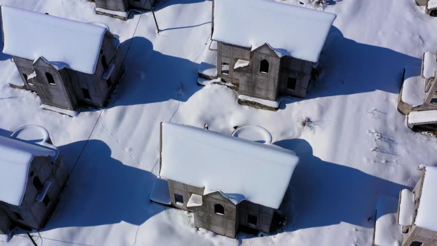 Top Down of abandoned castle double story homes in snow Royalty-Free Stock Footage #1103056577