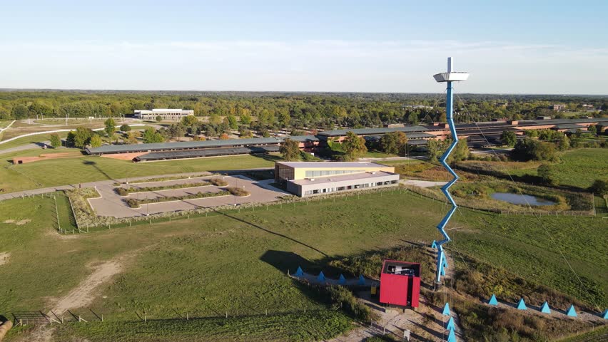 Tower and old farm buildings in Michigan, aerial drone view