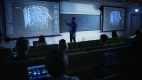 Young Male Teacher Giving a Data Science Lecture to Diverse Multiethnic Group of Female and Male Students in Dark College Room. Projecting Slideshow with Artificial Intelligence Network Architecture - Powered by Shutterstock - Get 15% off with code: PIKWIZARD15