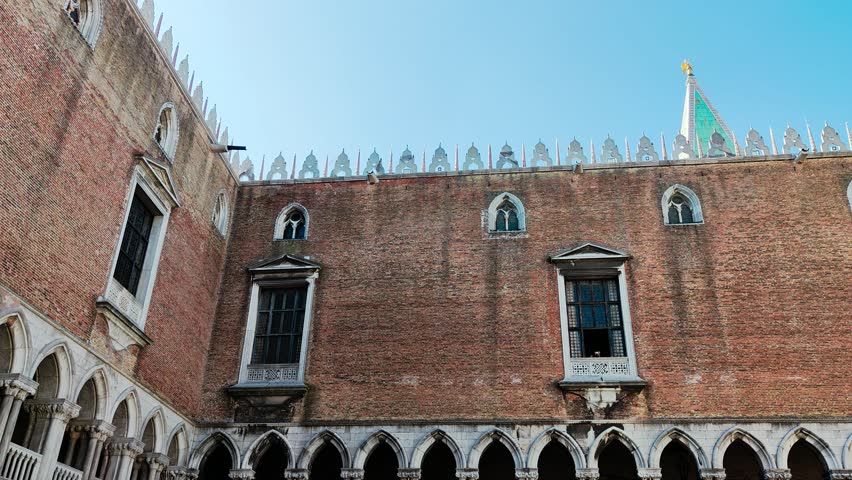 Doges palace in venice inner court yard slow motion camera pan