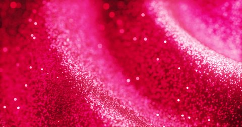 Стоковое видео: Wave of pink glitters as close up view from 3d rendering loop animation.