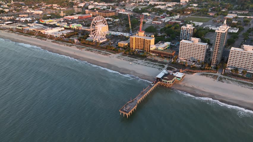 Aerial view of the Myrtle Beach fishing pier during a nice sunrise.