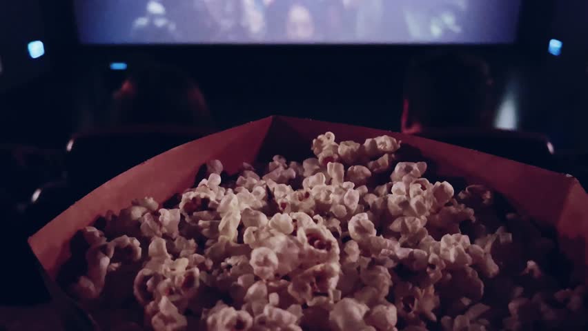 Cinema and entertainment, popcorn box in the movie theatre for tv show streaming service and film industry production. High quality 4k footage Royalty-Free Stock Footage #1103095227