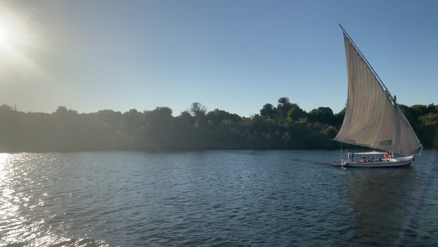 Beautiful landscape with felucca boats on the Nile river in Aswan, Egypt