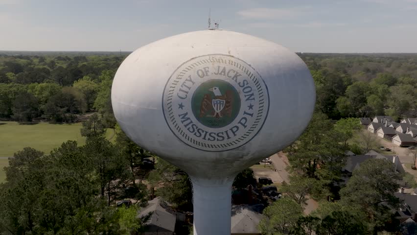 City of Jackson, Mississippi water tower with drone video pulling back. Royalty-Free Stock Footage #1103098657