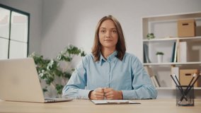 A Successful Young Woman Conducts a Video Broadcast on Work Issues. A Woman Conducts Remote Work Training Courses. Technological Tools For Remote Work. Remote Work as a Way to Increase Productivity.