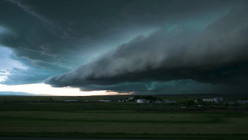 Big Storm Shelf Cloud Drifting Over Farm Land Time Lapse. High quality 4K footage from storm chasing.