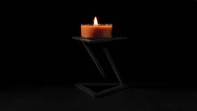 Floating Candle in a Dark Room, Black Background - Powered by Shutterstock - Get 15% off with code: PIKWIZARD15