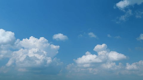 Withe clouds in a blue sky. White fluffy cumulonimbus clouds forming before thunderstorm. Timelapse. Adlı Stok Video
