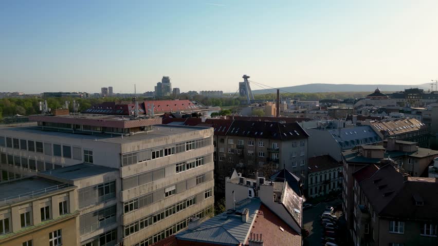 Aerial view of the streets of Bratislava, view of Danube River and Most SMP, 4k