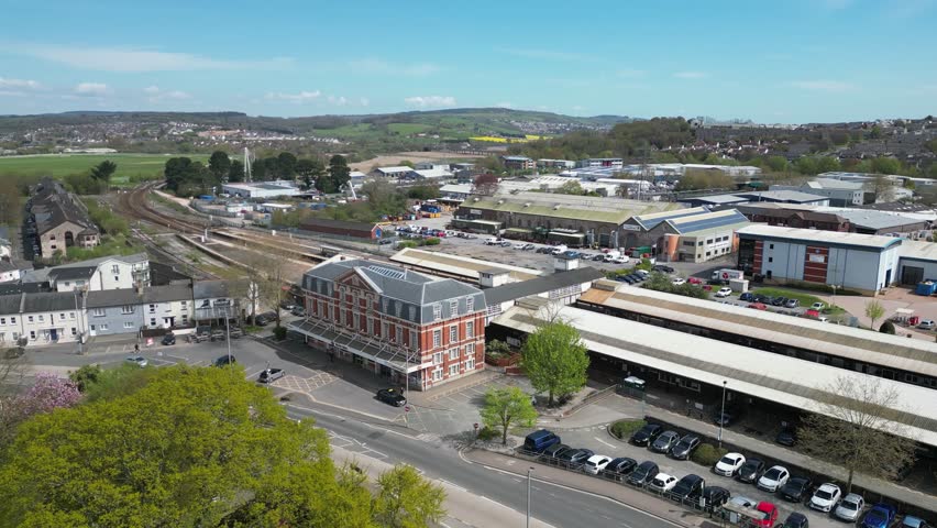 Circling Newton Abbot train station showing wider town