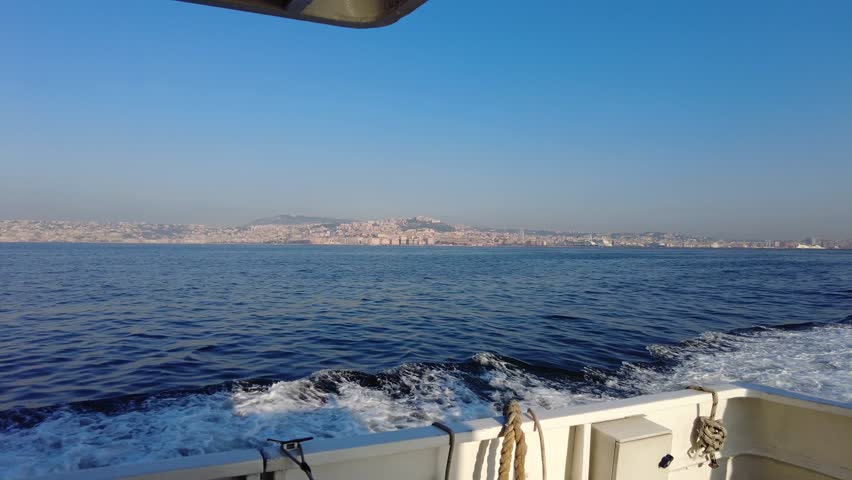Sailing On A Ferry Overlooking Gulf Of Naples In Italy During Summer. POV