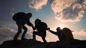 Helping hand in teamwork.Group of climbers daring climb to victory.People reach out to each other by hand providing help and support at every step of way.Power of teamwork.Together reach new heights - Powered by Shutterstock - Get 15% off with code: PIKWIZARD15
