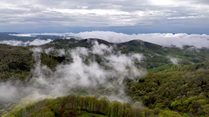 fog over mountain valley in appalachia near blowing rock and boone nc, north carolina holler Royalty-Free Stock Footage #1103141023