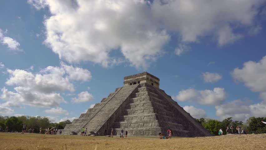 CHICHEN ITZA, MEXICO - Timelapse of El Castillo or Kukulkan temple, the Pyramid of Chichen Itza, landmark of Yucatan. Royalty-Free Stock Footage #1103142057