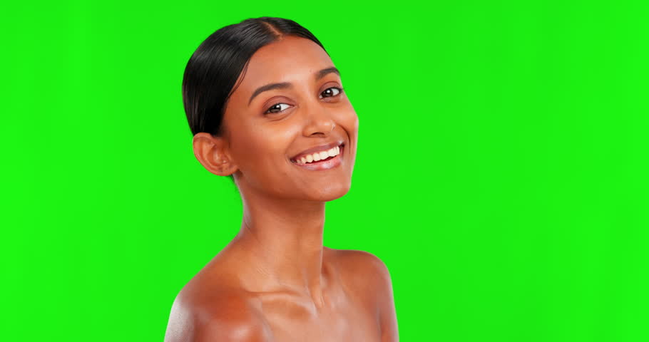 Skincare, smile and a woman on a green screen background in studio for natural beauty or cosmetics. Portrait, antiaging and treatment with a happy young female model advertising on chromakey mockup Royalty-Free Stock Footage #1103151005