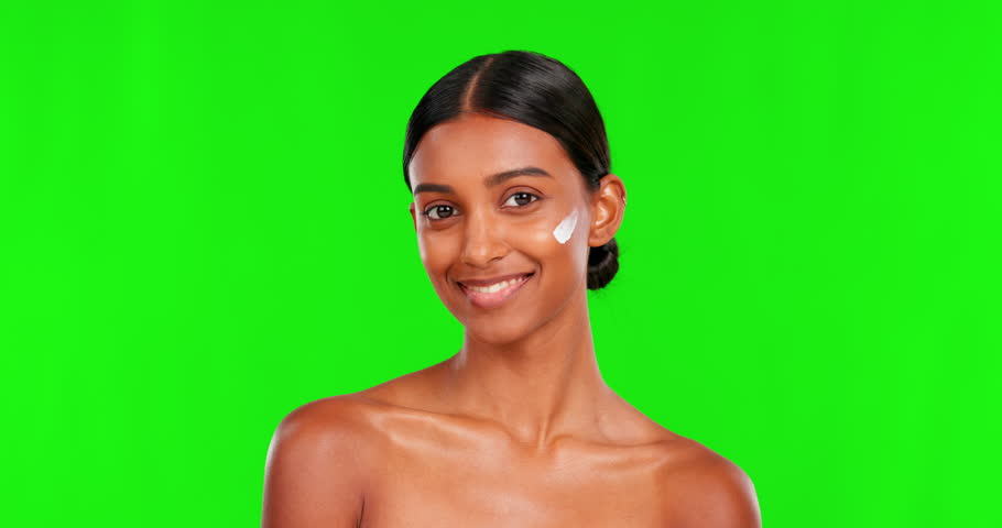 Beauty, lotion and okay with a woman on a green screen background in studio for natural skincare. Portrait, cream or antiaging treatment with a happy young female model marketing on chromakey mockup Royalty-Free Stock Footage #1103151017