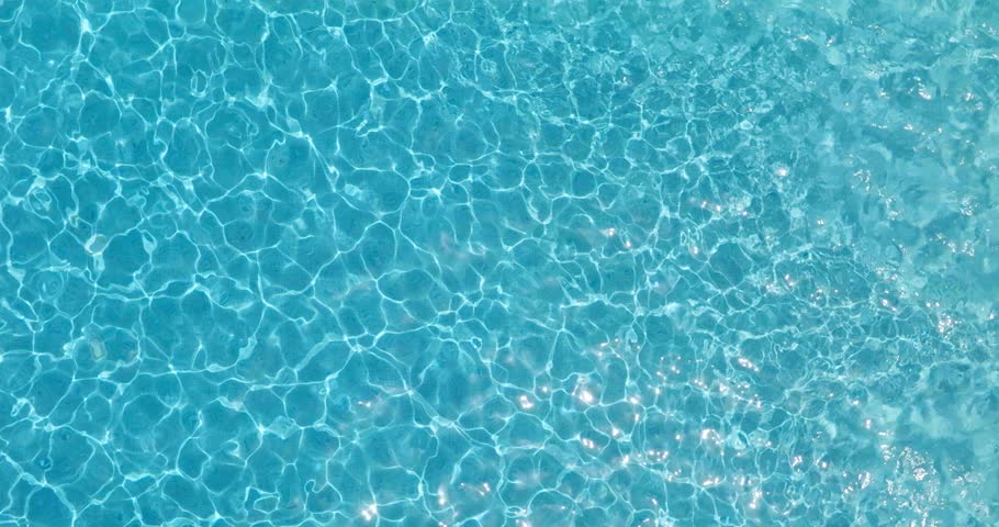 Blue water in the swimming pool with light reflections. Royalty-Free Stock Footage #1103151909
