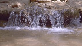 Slow motion of a waterfall in nature.