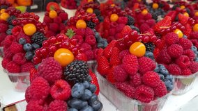 fruit, delicious red berries andforest fruits as a background. healthy fesh food concept 4k video 