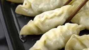 Chinese cuisine: fried dumplings video