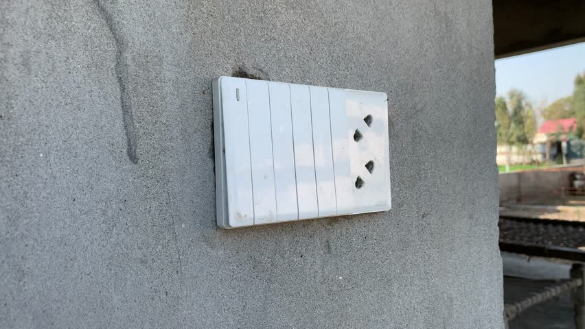 electric power switch on a wall
