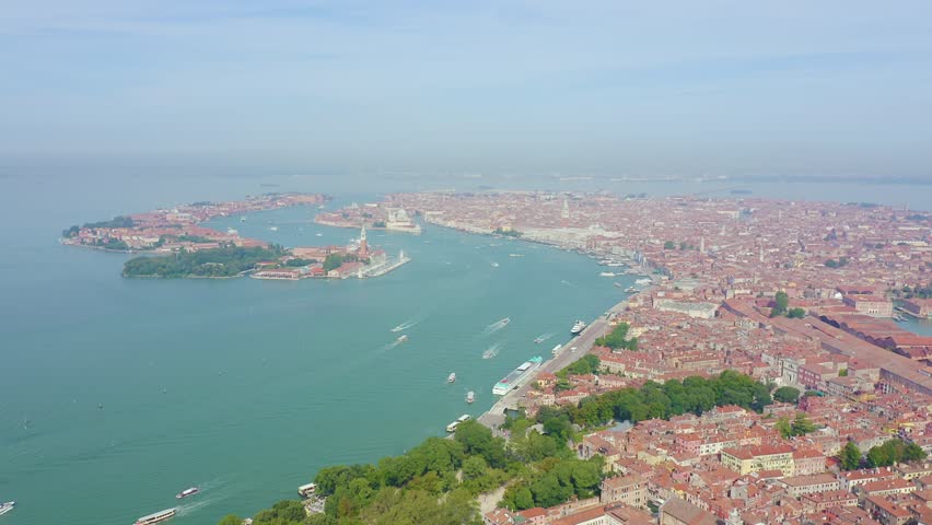Inscription on video. Venice, Italy. Panoramic view of the historic center of Venice. sunny day. Flames with dark fire, Aerial View
