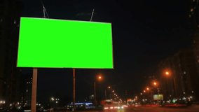 Time Lapse. A Billboard with a Green Screen on a Busy Street - Powered by Shutterstock - Get 15% off with code: PIKWIZARD15