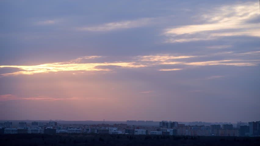 Sun shines through the clouds, overcast. timelapse. The sun