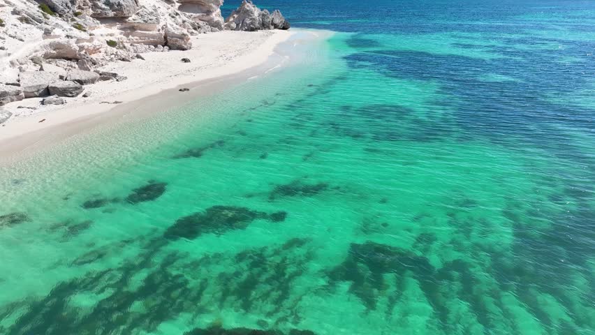 Hamelin Beach in Western Australia is a hidden gem that boasts some of the most crystal-clear waters in the world. As you explore the shoreline, you might even come across a friendly stingray.